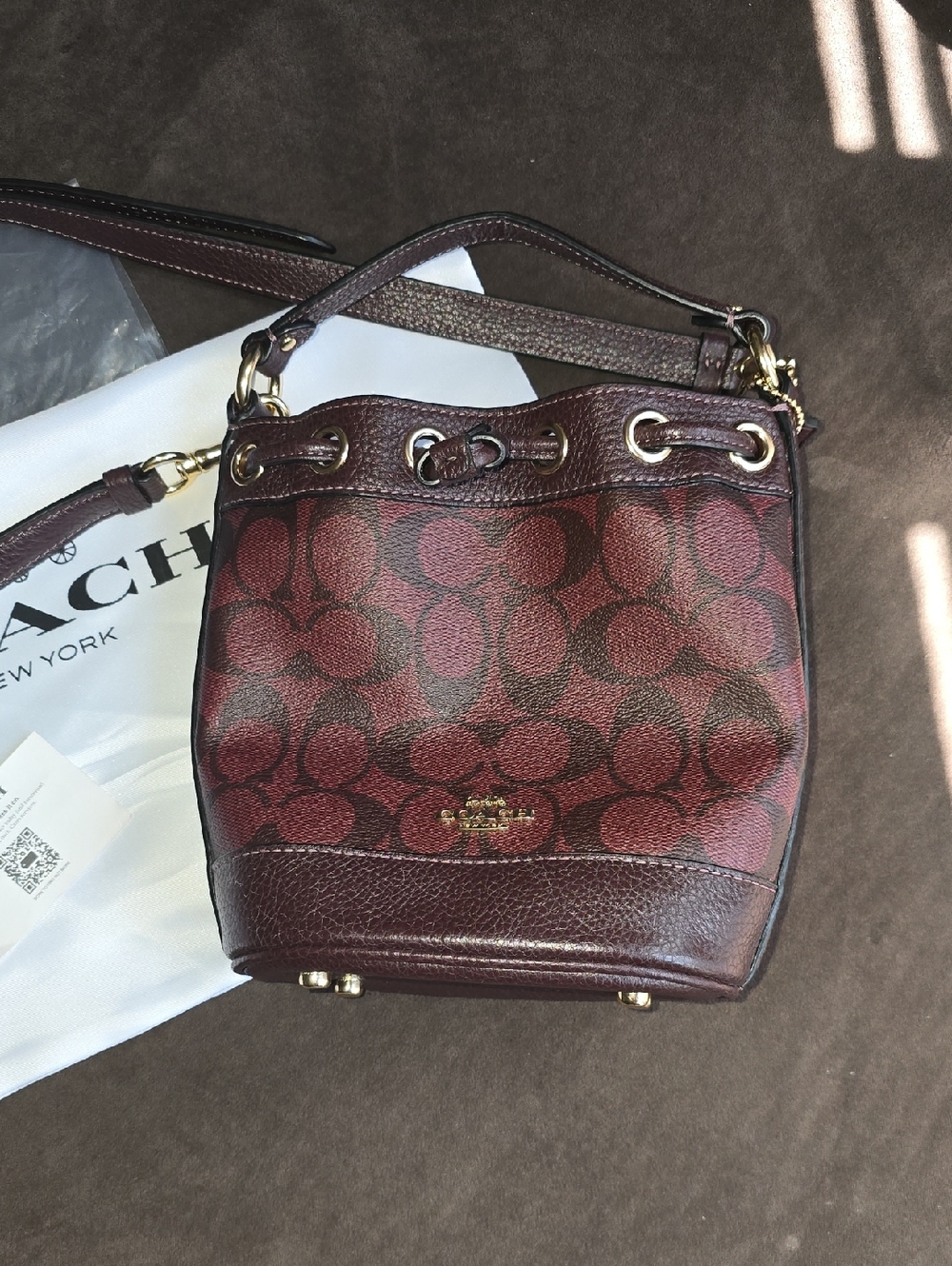 Coach Burgundy Signature Canvas Drawstring Crossbody Bag